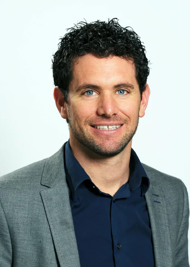 Josh Miller, founder of GoForClose, in a grey jacket